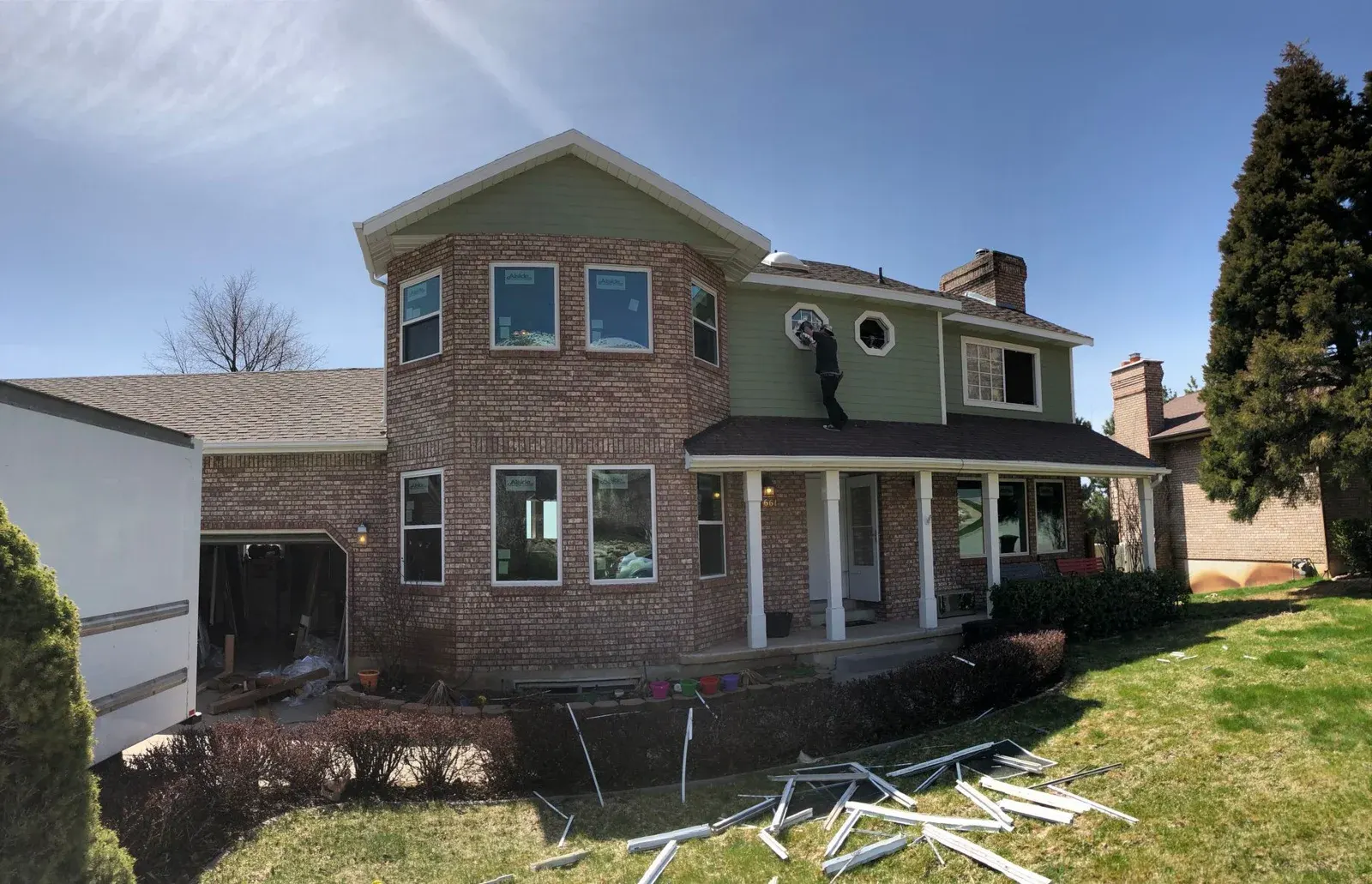 Two-story home with updated windows and a front porch