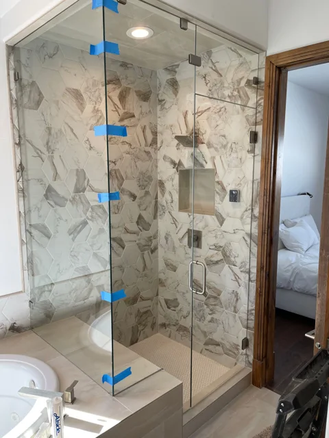 Custom glass shower enclosure